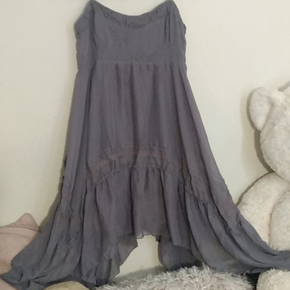 Soft classic Teddy top. Beautiful ruffles,  flowing side drapes.